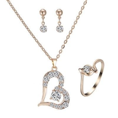 Heart Pendant Jewelry Set Rhinestone Jewellery $21.99 Dana Fashion Color: A Women's Accessories Product material: alloy Product size: pendant 30 * 22mm, earring 14 * 4mm, ring diameter 20mm Product chain: 42cm