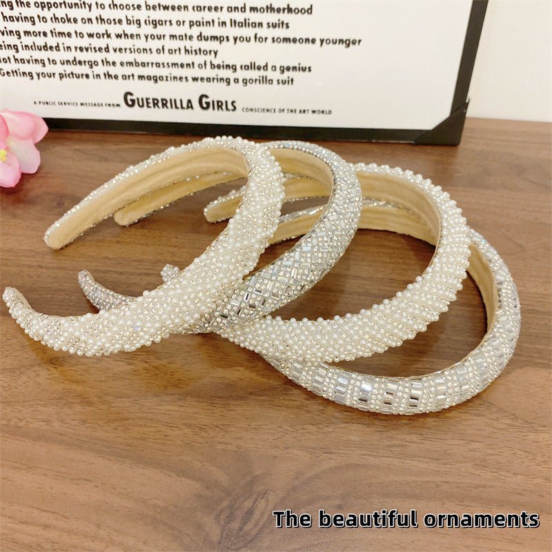Heavy Industry Light Luxury New High-grade High-definition Pearl Headband $20.00 Dana Fashion Color: Grid Pearl Women's Accessories Product information: Processing process: manual Color: straight terms, twill rhinestone style, twill Pearl style, rhineston