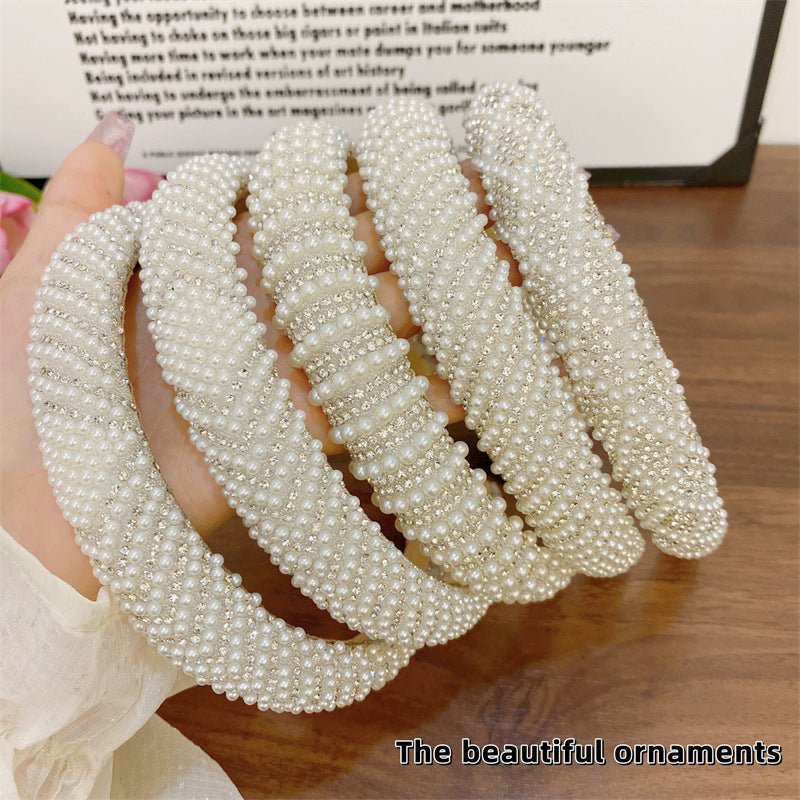 Heavy Industry Light Luxury New High-grade High-definition Pearl Headband $20.00 Dana Fashion Color: Grid Pearl Women's Accessories Product information: Processing process: manual Color: straight terms, twill rhinestone style, twill Pearl style, rhineston