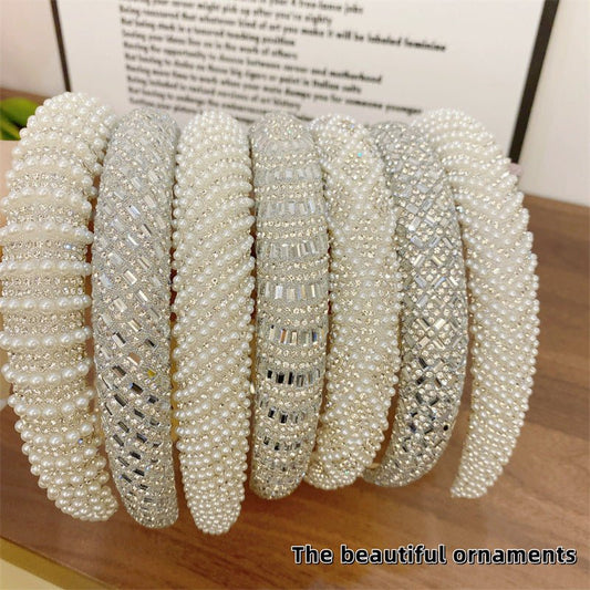 Heavy Industry Light Luxury New High-grade High-definition Pearl Headband $20.00 Dana Fashion Color: Grid Pearl Women's Accessories Product information: Processing process: manual Color: straight terms, twill rhinestone style, twill Pearl style, rhineston