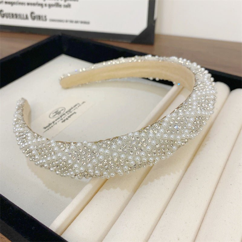 Heavy Industry Light Luxury New High-grade High-definition Pearl Headband $20.00 Dana Fashion Color: Grid Pearl Women's Accessories Product information: Processing process: manual Color: straight terms, twill rhinestone style, twill Pearl style, rhineston