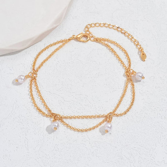 Hexagonal Star With Pearl Anklet Elegant High-grade Design Light Luxury $23.77 Dana Fashion Color: Gold Inlaid Pearl Style Women's Accessories Product information: Color: gold with Pearl Style: Women's Material: Copper Shape: Star Style: affordable luxury