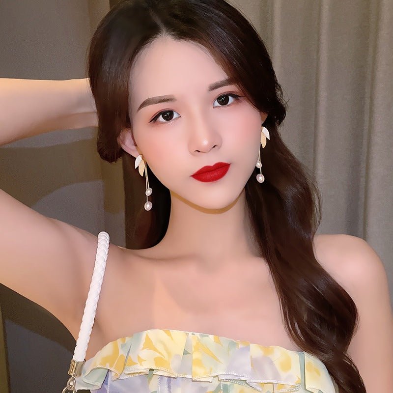 High-end Fashion 925 Silver Needle Autumn And Winter Leaves Pearl Tassel Earrings $13.51 Dana Fashion Color: 408 Champagne Women's Accessories Product information: Treatment Process: baking varnish Color: 408 champagne, 427 gray White Applicable people: w