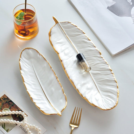 High-end Ideas For Household Ceramics, Dishes And Plates For Steaming Fish $38.69 Dana Fashion Color: Gold painted matte white Size: Small Dana's Kitchen Product information: Material: Porcelain Surface technology: electroplating Ceramics: Porcelain patte