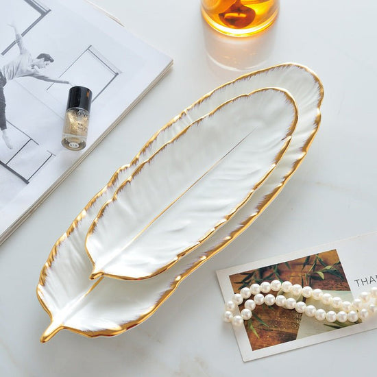 High-end Ideas For Household Ceramics, Dishes And Plates For Steaming Fish $38.69 Dana Fashion Color: Gold painted matte white Size: Small Dana's Kitchen Product information: Material: Porcelain Surface technology: electroplating Ceramics: Porcelain patte
