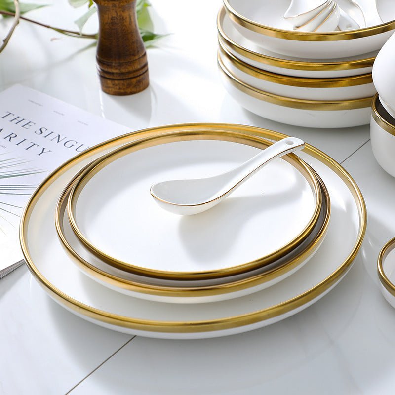 High-end tableware set $135.29 Dana Fashion Quantity: Q9pcs Set Dana's Kitchen Name: Nordic gold-plated tableware series Header: multiple configurations are optional Material: Ceramic Color: matte white Features: Delicate texture and multi-vessel type Pac