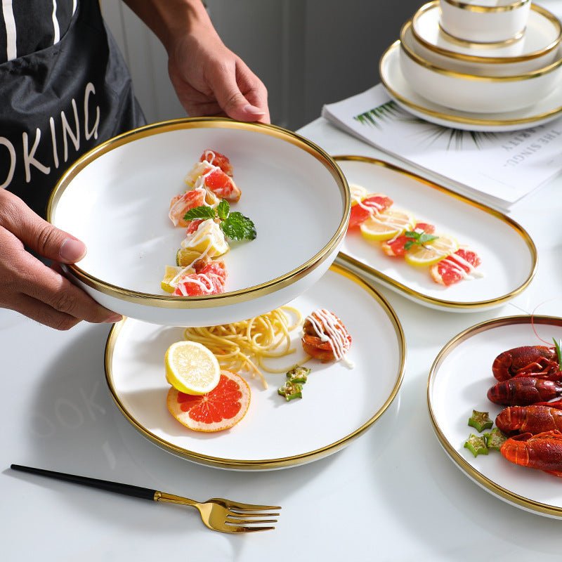 High-end tableware set $135.29 Dana Fashion Quantity: Q9pcs Set Dana's Kitchen Name: Nordic gold-plated tableware series Header: multiple configurations are optional Material: Ceramic Color: matte white Features: Delicate texture and multi-vessel type Pac