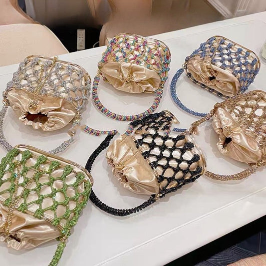High-grade Heavy Hand-woven Shiny Rhinestone Strip Metal Birdcage Portable Basket $89.50 Dana Fashion Color: Black Women's Bags Product information: Lining texture: Nylon Color: silver, gold, black, green, colorful, light blue Material: Rhinestone Popular