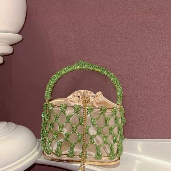 High-grade Heavy Hand-woven Shiny Rhinestone Strip Metal Birdcage Portable Basket $89.50 Dana Fashion Color: Black Women's Bags Product information: Lining texture: Nylon Color: silver, gold, black, green, colorful, light blue Material: Rhinestone Popular