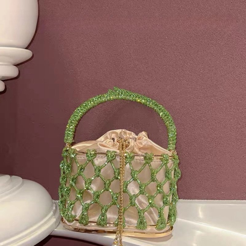 High-grade Heavy Hand-woven Shiny Rhinestone Strip Metal Birdcage Portable Basket $89.50 Dana Fashion Color: Black Women's Bags Product information: Lining texture: Nylon Color: silver, gold, black, green, colorful, light blue Material: Rhinestone Popular