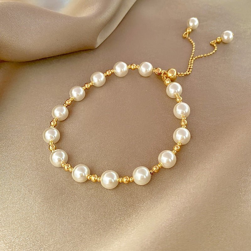 High-grade Light Luxury And Simplicity Pearl Bracelet $14.90 Dana Fashion Color: Pearl Double Layer S330 Gold Women's Accessories Product information: Treatment Process: Electroplating Color: Pearl bracelet-S128 gold, pearl double layer bracelet-S330 gold