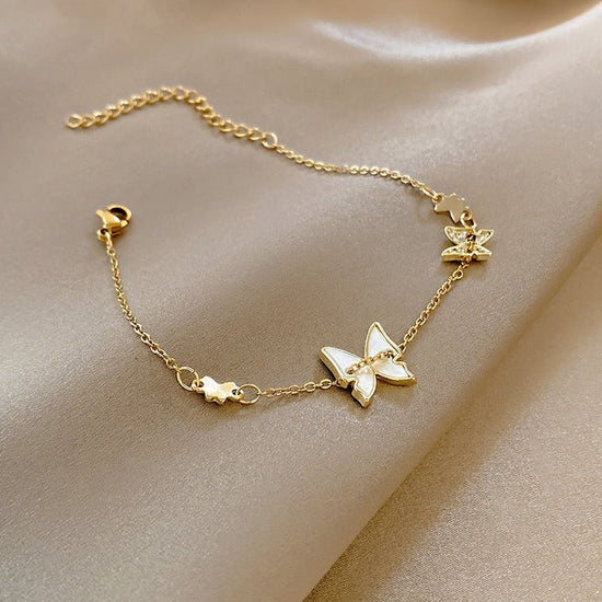 High-grade Light Luxury And Simplicity Pearl Bracelet $14.90 Dana Fashion Color: Butterfly Bracelet S125 Gold Women's Accessories Product information: Treatment Process: Electroplating Color: Pearl bracelet-S128 gold, pearl double layer bracelet-S330 gold