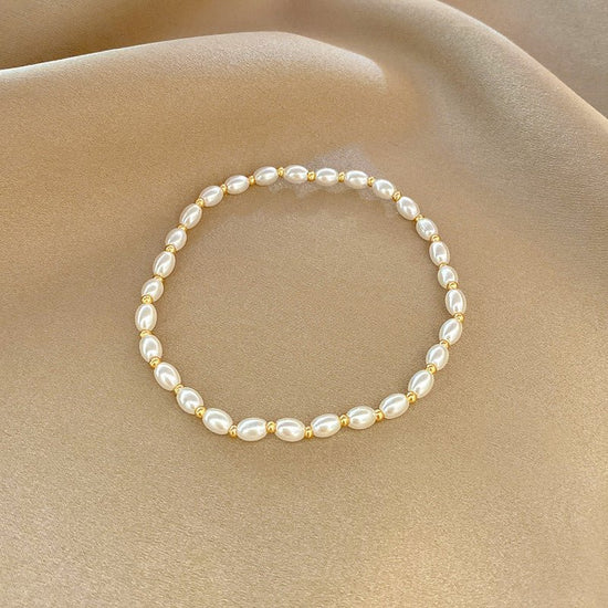 High-grade Light Luxury And Simplicity Pearl Bracelet $14.90 Dana Fashion Color: A String Of Pearls S316 Women's Accessories Product information: Treatment Process: Electroplating Color: Pearl bracelet-S128 gold, pearl double layer bracelet-S330 gold, sma