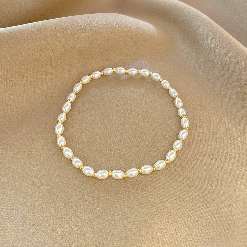 High-grade Light Luxury And Simplicity Pearl Bracelet $14.90 Dana Fashion Color: A String Of Pearls S316 Women's Accessories Product information: Treatment Process: Electroplating Color: Pearl bracelet-S128 gold, pearl double layer bracelet-S330 gold, sma