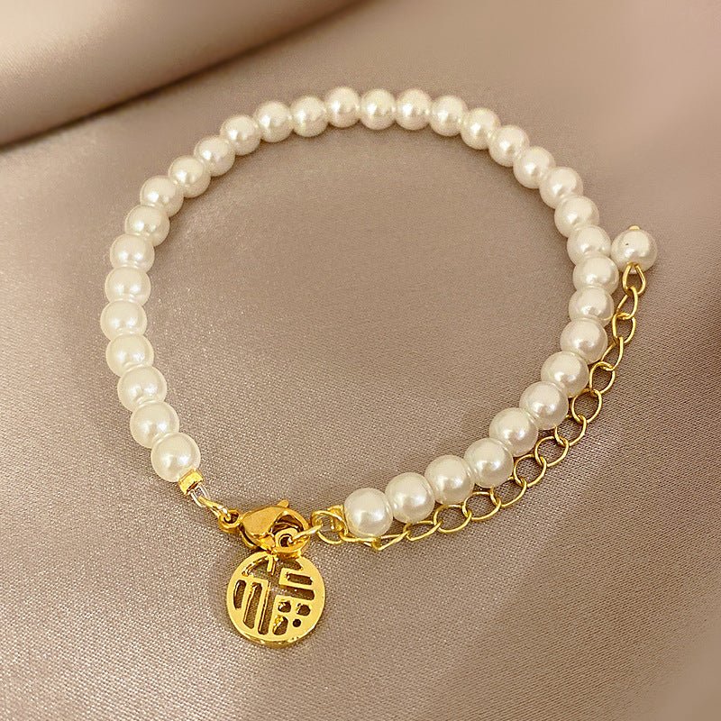 High-grade Light Luxury And Simplicity Pearl Bracelet $14.90 Dana Fashion Color: Pig Nose S371 Gold Women's Accessories Product information: Treatment Process: Electroplating Color: Pearl bracelet-S128 gold, pearl double layer bracelet-S330 gold, small wa
