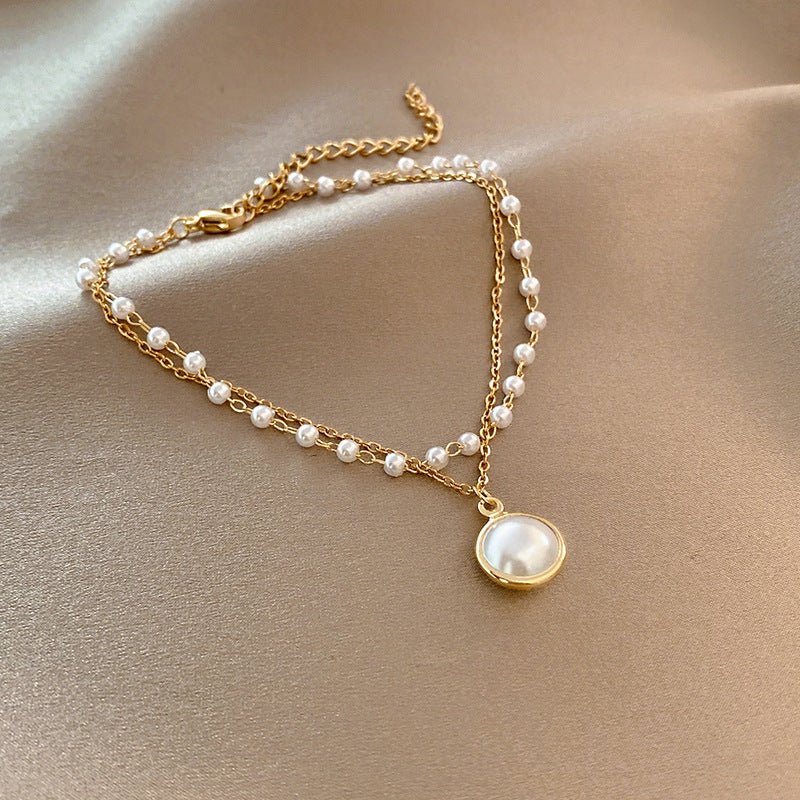 High-grade Light Luxury And Simplicity Pearl Bracelet $14.90 Dana Fashion Color: Pearl S128 Gold Women's Accessories Product information: Treatment Process: Electroplating Color: Pearl bracelet-S128 gold, pearl double layer bracelet-S330 gold, small waist