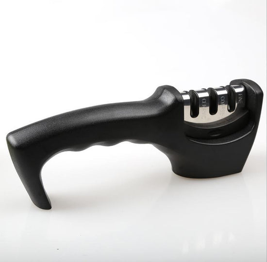 High Quality Professional Knife Sharpener $29.50 Dana Fashion Color: Black Dana's Kitchen Overview: 1. Stylish and safe design, easy to clean and store. 2. Anti-slip rubber feet to ensure stability when sharpening the knife 3. Three-level sharpening (fine
