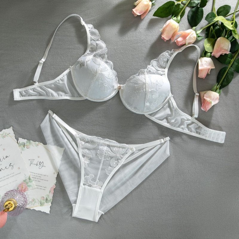 Hollow Out Embroidery With Bra Pad Underwear Set For Women $56.50 Dana Fashion Color: White Size: L Women's clothing Product information : Main fabric composition: polyester fiber (polyester) Style: traditional type Mould cup type: thin mould cup Shoulder