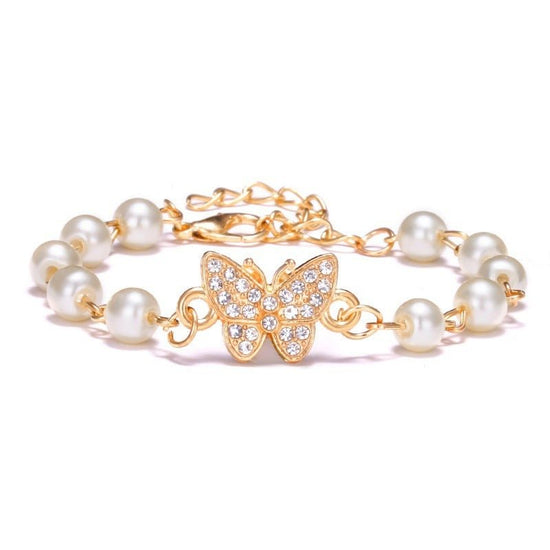 Hollow Rhinestone Pearl Bracelet Multi-style Adjustable $8.50 Dana Fashion Color: Butterfly Women's Accessories Product information: Treatment Process: Pearl Inlay Color: Cross, 8 words round, Moon XINGX, starfish, butterfly, heart-shaped wings, 8 words R