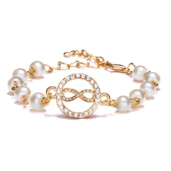 Hollow Rhinestone Pearl Bracelet Multi-style Adjustable $8.50 Dana Fashion Color: 8 Round Women's Accessories Product information: Treatment Process: Pearl Inlay Color: Cross, 8 words round, Moon XINGX, starfish, butterfly, heart-shaped wings, 8 words Rhi