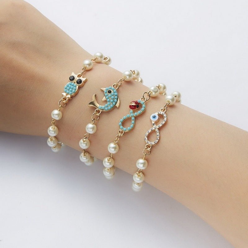 Hollow Rhinestone Pearl Bracelet Multi-style Adjustable $8.50 Dana Fashion Color: 8 Eyes Rhinestone Women's Accessories Product information: Treatment Process: Pearl Inlay Color: Cross, 8 words round, Moon XINGX, starfish, butterfly, heart-shaped wings, 8