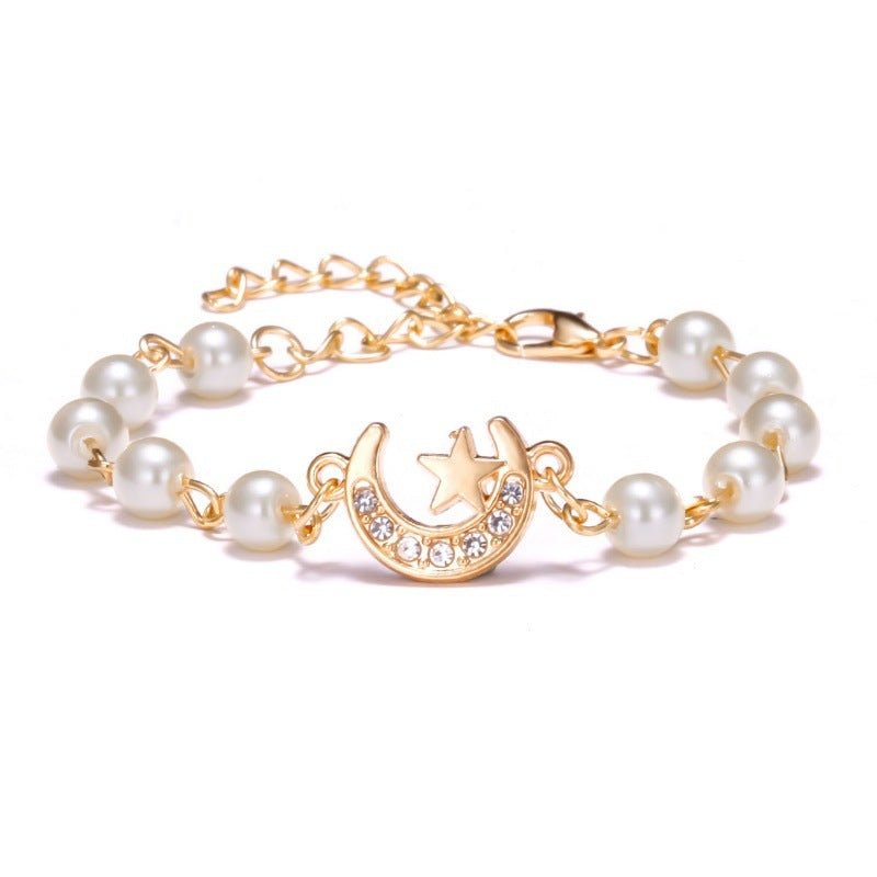 Hollow Rhinestone Pearl Bracelet Multi-style Adjustable $8.50 Dana Fashion Color: Moon XINGX Women's Accessories Product information: Treatment Process: Pearl Inlay Color: Cross, 8 words round, Moon XINGX, starfish, butterfly, heart-shaped wings, 8 words