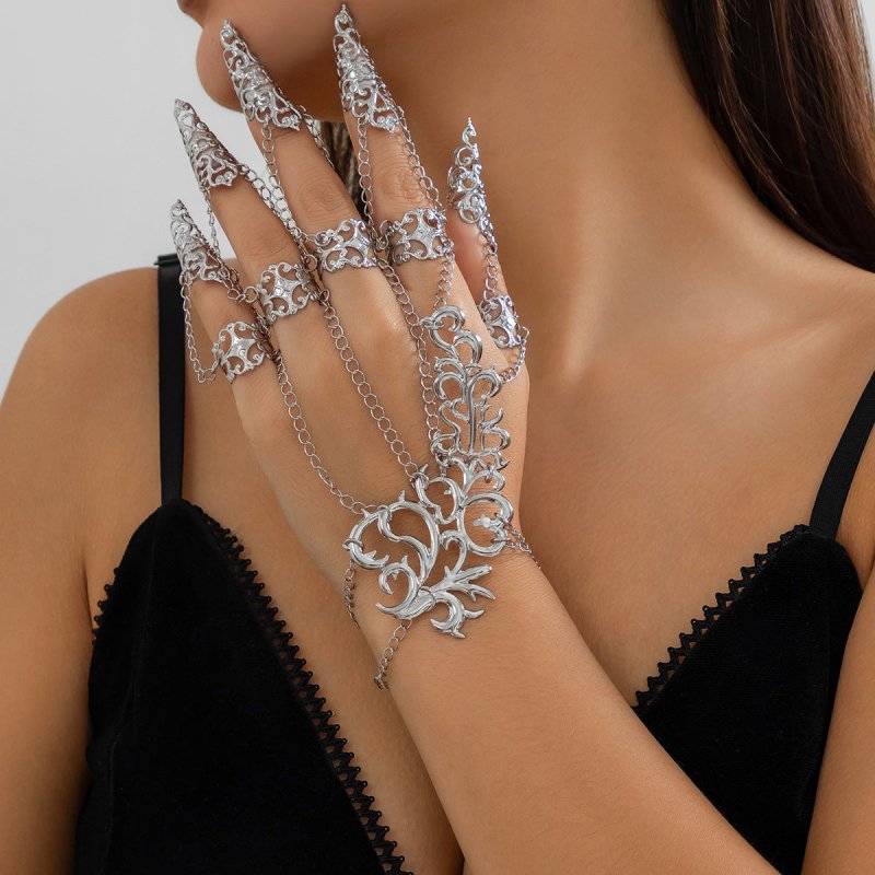 Hollow Tapered Fingernail Cap Mitten-type Bracelet Women $16.29 Dana Fashion Color: Black 2323 Women's Accessories Product information: Treatment Process: Electroplating Color: gold 2323, white k 2323, black 2323 Applicable population: Female Material: Al
