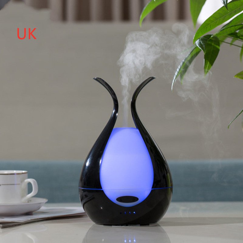 Home Office Humidifier Small Essential Oil Night Light Aroma Diffuser $95.00 Dana Fashion Color: Colorful black Style: UK Beauty Tools @font-face{font-family:"Times New Roman";}@font-face{font-family:"宋体";}@font-face{font-family:"Calibri";}p.MsoNormal{mso