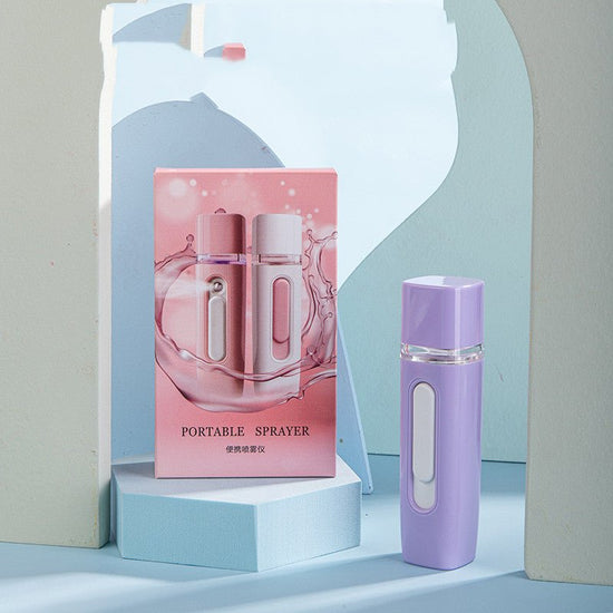 Home Rechargeable Water Replenishing Instrument Steamed Face Sprayer $22.50 Dana Fashion Color: V27 card box purple Model: USB Beauty Tools Overview: 1.Nano technology: convert water into a large number of water molecules, water quickly penetrates into th