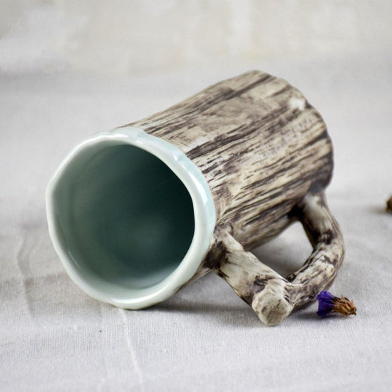 Hot bark mugs $31.32 Dana Fashion Color: 300ml Dana's Kitchen Product category: Ceramic cup Material: porcelain Applicable people: General Style: Creative Suitable for gift occasions: business gifts Shape: Irregular shape Function: Health care Structure: