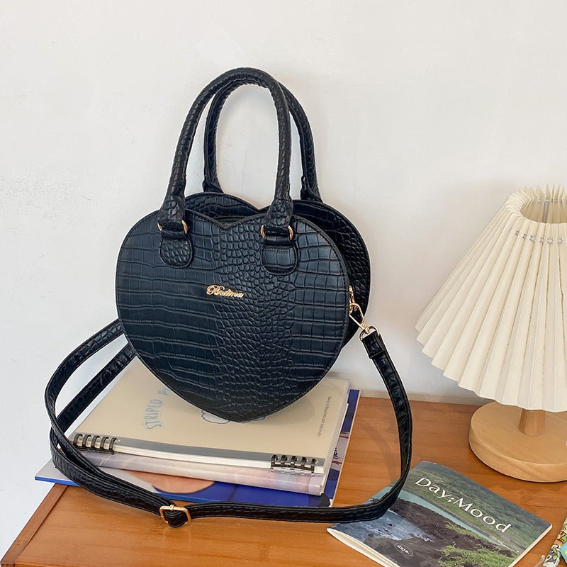 Hot Girl Style Handbag Pattern Love Shoulder Crossbody $43.44 Dana Fashion Color: Black Women's Bags Product information: Lining texture: PU Color: black, white, red Outer bag type: Sandwich pocket Material: PU Suitcase shape: heart shape Style: street tr