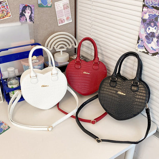 Hot Girl Style Handbag Pattern Love Shoulder Crossbody $43.44 Dana Fashion Color: Black Women's Bags Product information: Lining texture: PU Color: black, white, red Outer bag type: Sandwich pocket Material: PU Suitcase shape: heart shape Style: street tr