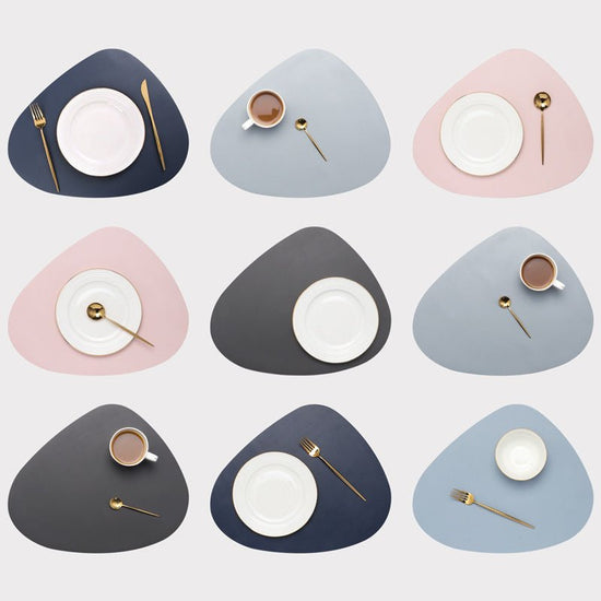 Household leather table mat $28.50 Dana Fashion Color: Blackstone blue Dana's Kitchen Type of trim panel and accessories: cushion and cushion Features: environmental friendly Material: PU leather Size: large: 45cm * 36.8cm, small: 13cm * 11cm Features: Wa