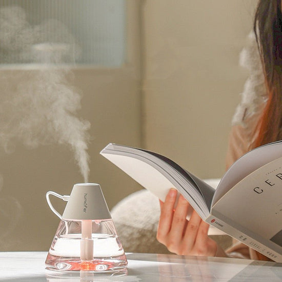 Humidifier Desktop On Board Air Purifier $22.28 Dana Fashion Color: Black Electrical outlet: USB Beauty Tools Product information: Model: volcano humidifier Applicable area: 10-20m2 Water tank capacity: below 0.5L Function: atmosphere lamp Number of fog o
