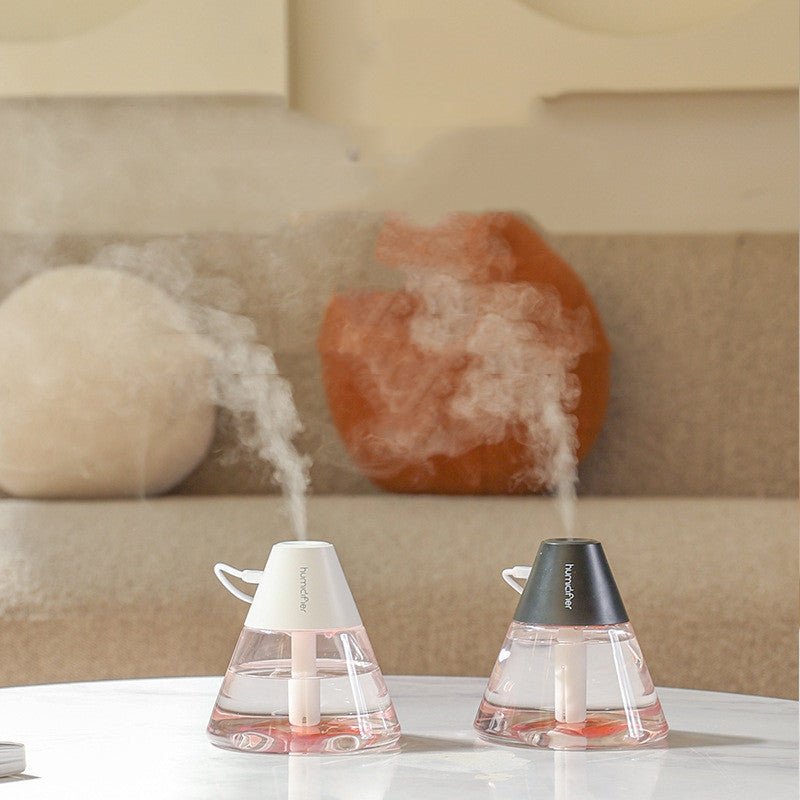 Humidifier Desktop On Board Air Purifier $22.28 Dana Fashion Color: Black Electrical outlet: USB Beauty Tools Product information: Model: volcano humidifier Applicable area: 10-20m2 Water tank capacity: below 0.5L Function: atmosphere lamp Number of fog o