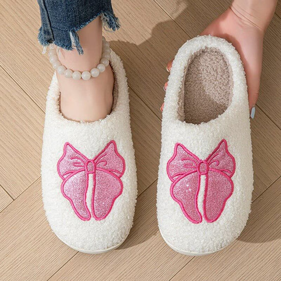 Indoor Non-slip Warm Bow Cotton Slippers $30.50 Dana Fashion Color: White Size: 35to36 Women's shoes Product information: Lining material: Cotton Color: white, pink Size: 35-36,37-38,39-40,41-42,43-44 Sole craft: sewing shoes Popular elements: Bow Style: