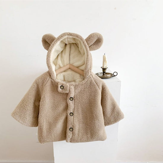 Infant Child Cloak Winter Hooded $40.87 Dana Fashion Color: Beige Suitable For Height: 100cm Baby Clothing Product information: Color: beige, khaki Applicable height: 73CM,80cm,90cm,100cm,110cm Closed style: single-breasted Main fabric composition: Cotton