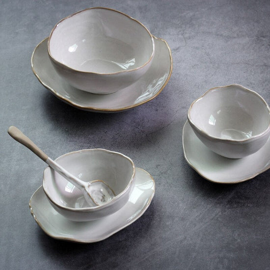 Irregular ceramic bowl dinner plate $30.07 Dana Fashion Color: Deep plate Dana's Kitchen Category: bowl, plate Material: Ceramic Features: Hand-made irregular shapes, the effect of combining white kiln glaze and loess, make every tableware look vivid and