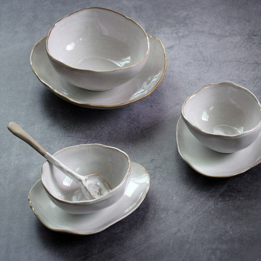 Irregular ceramic bowl dinner plate $30.07 Dana Fashion Color: Deep plate Dana's Kitchen Category: bowl, plate Material: Ceramic Features: Hand-made irregular shapes, the effect of combining white kiln glaze and loess, make every tableware look vivid and