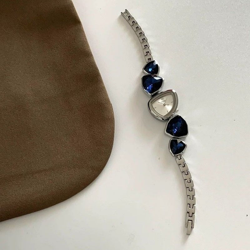 Irregular Niche Art Women's Bracelet Watch $79.00 Dana Fashion Color: Crystal Blue Women's Accessories Product information: Movement type: quartz movement Strap material: Stainless steel Buckle style: Jewelry buckle Dial diameter: 26mm Waterproof depth: 3