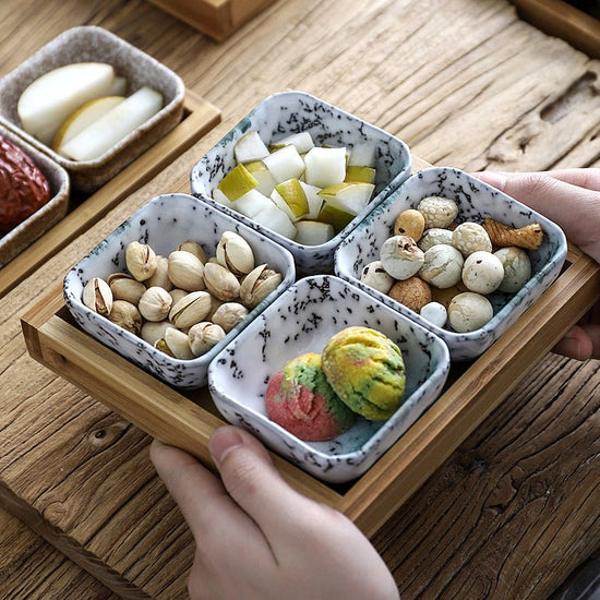 Japan Style Ceramic Fruits Plates with Bamboo Serving Tray $98.50 Dana Fashion style: A2 Dana's Kitchen Product Information: Product category Fruit plate: Product quality grade First-class product: Style: Japanese Color classification: A2, A3, A4, A6, B2,