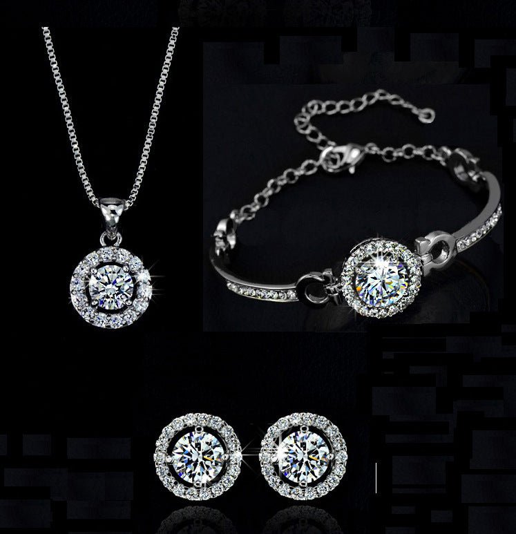 Jewelry sets $22.00 Dana Fashion Color: Silver style: Set of 3 Women's Accessories Material: alloy Treatment process: set diamond Style: women's style Set combination: earring + collar Inlaid material: not inlaid Circumference :21cm(inclusive)-50cm(inclus