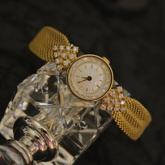 Jewelry Vintage Watches Kaleidoscope Diamond Quartz Women's Watch $140.00 Dana Fashion Color: Gold Strap White Noodles Women's Accessories Product information: Color: gold strap gold noodles, silver, gold strap white noodles Dial: 2CM, 7mm thick, syntheti