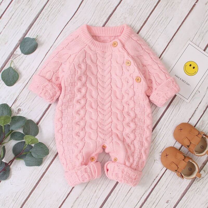 Knitted solid color baby jumpsuit $32.50 Dana Fashion Color: Pink Size: 100cm Baby Clothing Applicable gender: neutral Sleeve length: long sleeve Whether hooded: not hooded Fabric name: acrylic Closed style: single-breasted size Clothing length bust Hips