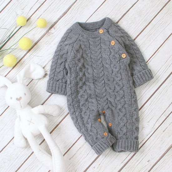 Knitted solid color baby jumpsuit $32.50 Dana Fashion Color: Grey Size: 100cm Baby Clothing Applicable gender: neutral Sleeve length: long sleeve Whether hooded: not hooded Fabric name: acrylic Closed style: single-breasted size Clothing length bust Hips