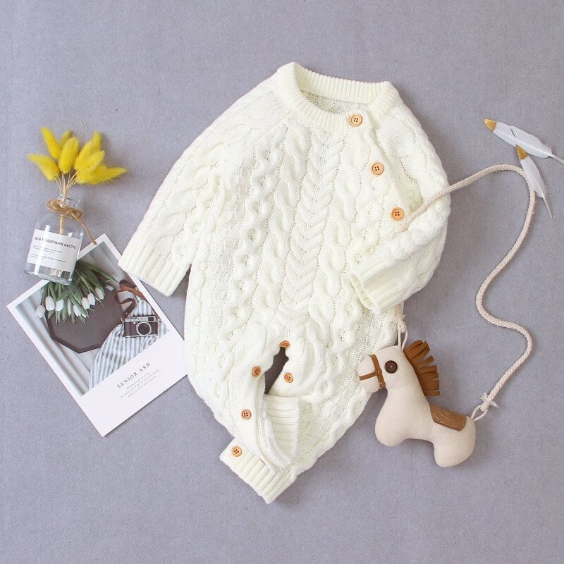 Knitted solid color baby jumpsuit $32.50 Dana Fashion Color: White Size: 100cm Baby Clothing Applicable gender: neutral Sleeve length: long sleeve Whether hooded: not hooded Fabric name: acrylic Closed style: single-breasted size Clothing length bust Hips