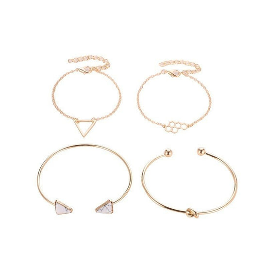 Knotted Triangle Honeycomb Four-piece Bracelet $15.00 Dana Fashion Color: Gold Women's Accessories Product information: Treatment Process: Electroplating Color: Gold Material: Alloy Popular elements: fu character Packing list: Four piece bracelet set * 1