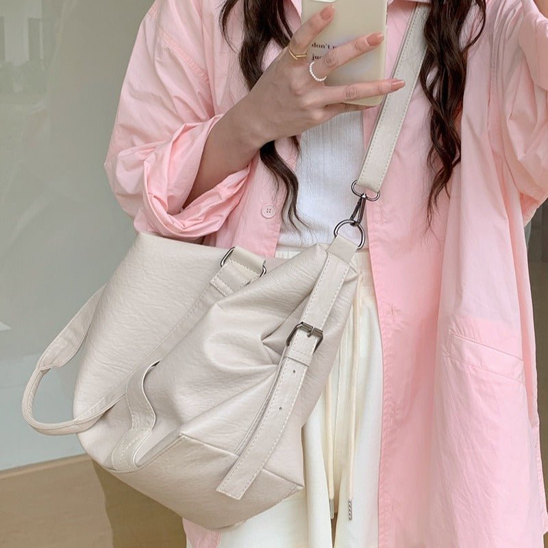 Korean Casual Portable Large-capacity Luggage Bag $45.50 Dana Fashion Color: Beige Women's Bags Product information: Lining text: Polyester Applicable scenario: leisure travel Color: black, cream white, brown Outer bag type: split pocket Hardness: soft Ma