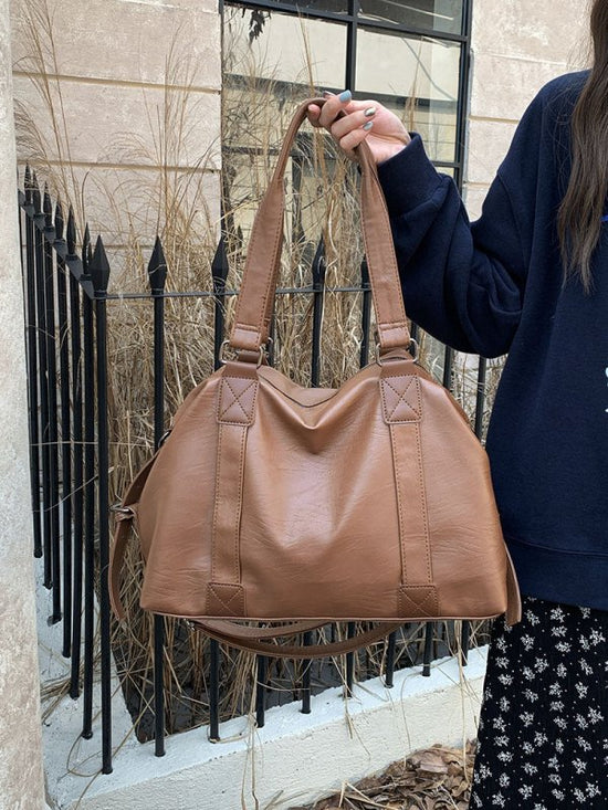 Korean Casual Portable Large-capacity Luggage Bag $45.50 Dana Fashion Color: Brown Women's Bags Product information: Lining text: Polyester Applicable scenario: leisure travel Color: black, cream white, brown Outer bag type: split pocket Hardness: soft Ma