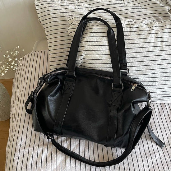 Korean Casual Portable Large-capacity Luggage Bag $45.50 Dana Fashion Color: Beige Women's Bags Product information: Lining text: Polyester Applicable scenario: leisure travel Color: black, cream white, brown Outer bag type: split pocket Hardness: soft Ma